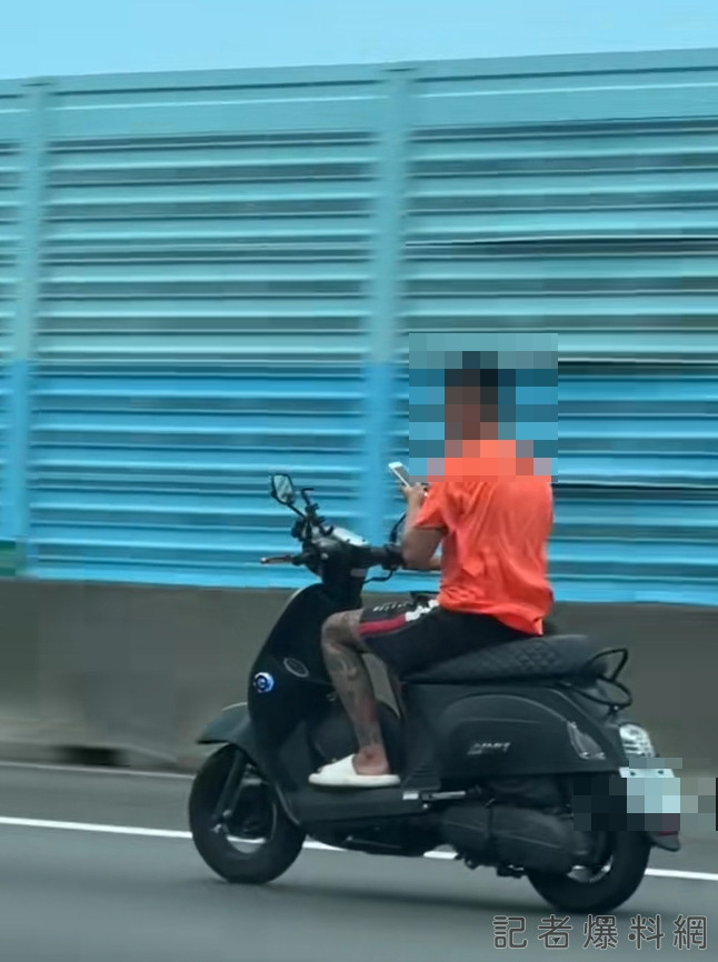 國道新款猴？！用路人目擊橘衣男 騎車闖國道疑邊騎邊自拍